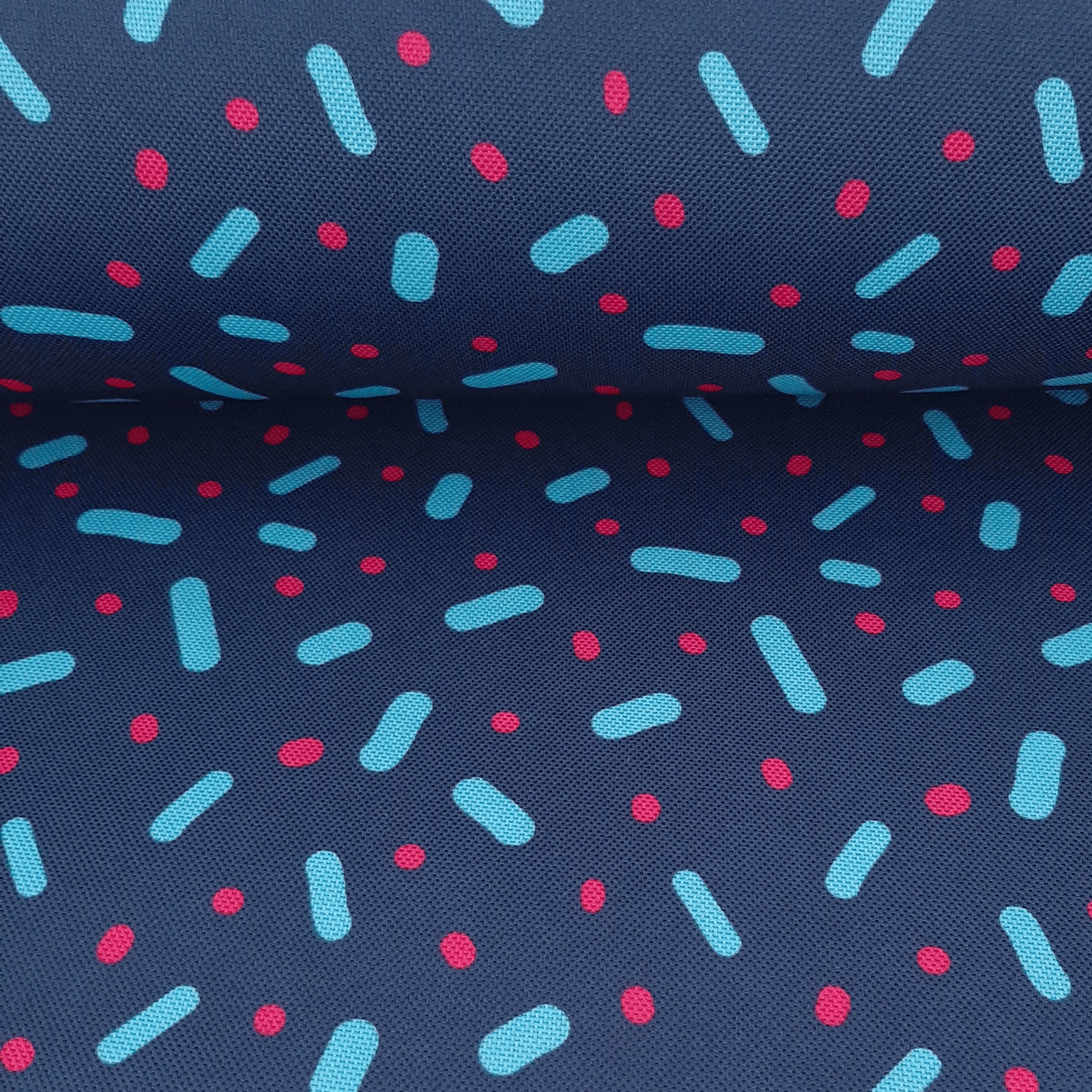 Sprinkles - PES-kangas, jossa on pinnoite